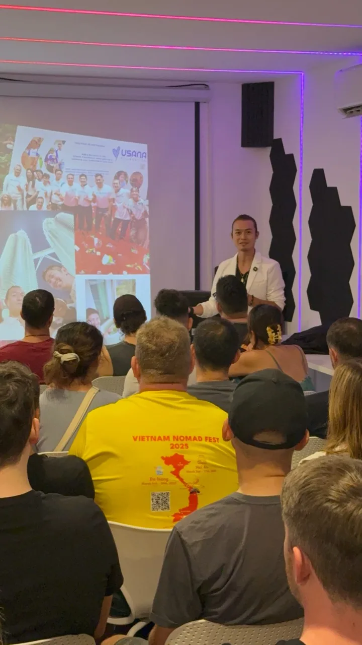 Freeman presenting to a full room at Vietnam Nomad Fest 2026